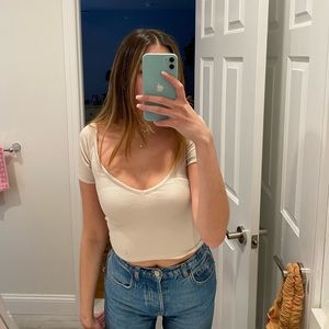 beige off the shoulder urban outfitters t shirt